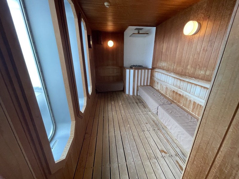 Wooden men’s sauna with window view of the ocean on the Ferry Soleil, Japan