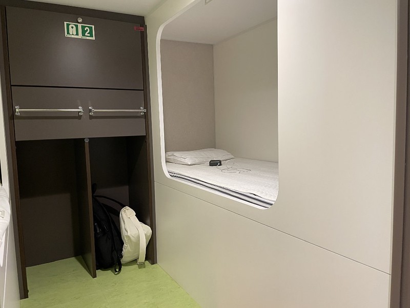 A Tourist S berth with mattress, pillow and pull-down screen for privacy, as well as storage space and a locker, on the Ferry Soleil, Japan