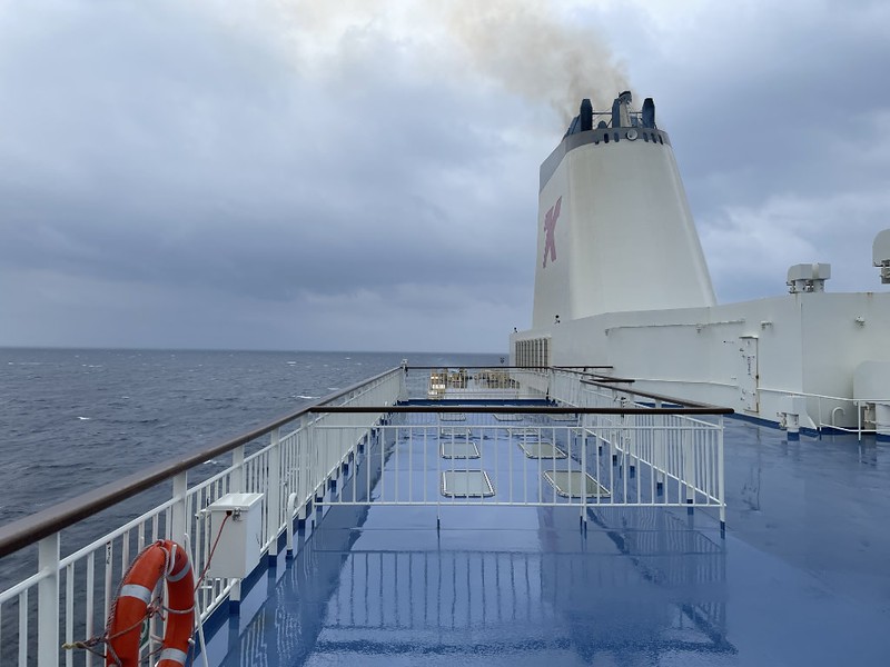 View back over the upper deck of the Ferry Soleil and the Pacific Ocean on a cloudy morning