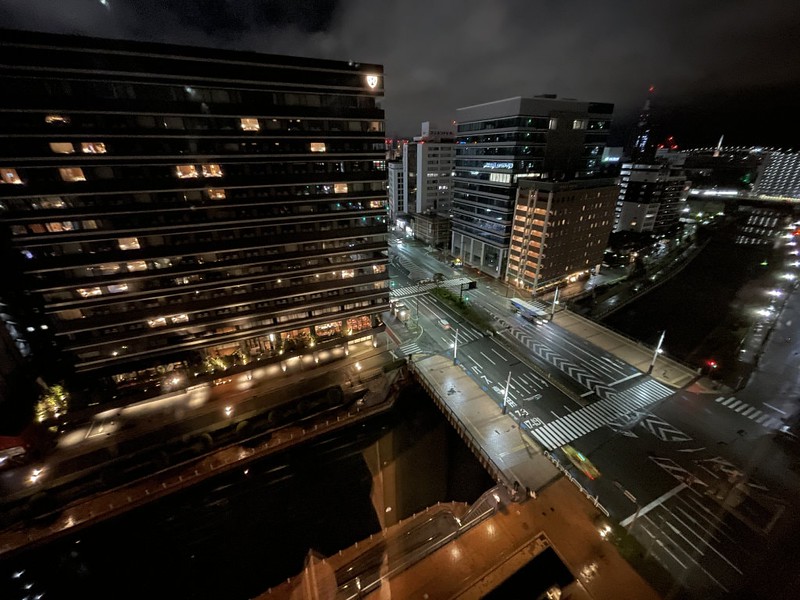 Night view of Fukuoka looking down on the streets and illuminated buildings from the window of the Hotel Okura Fukuoka