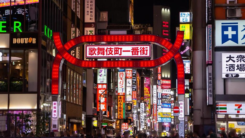 View of the many illuminated signs in a street in Kabukicho, Tokyo at night