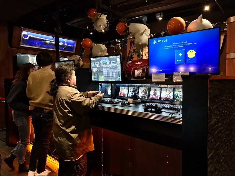 Playing Final Fantasy games in the cafe.