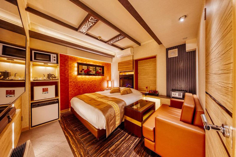 Gold-tinted guest room in the Lotus Shibuya love hotel, Tokyo Gold-tinted guest room in the Lotus Shibuya love hotel, Tokyo