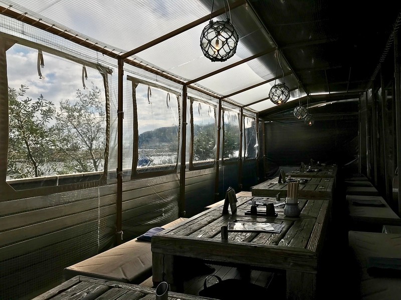 Covered terrace seating at Koya.