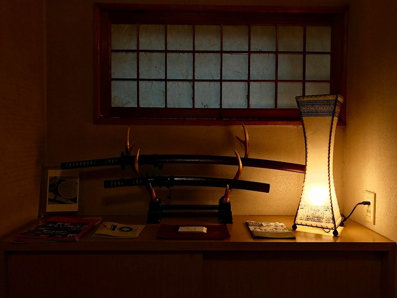 On your left as you walk in is a display of katana swords.