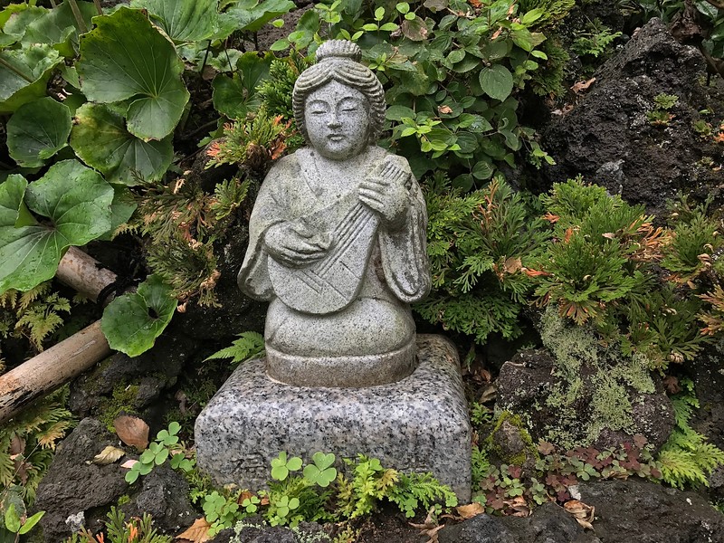 A small statue of the goddess Benzaiten.