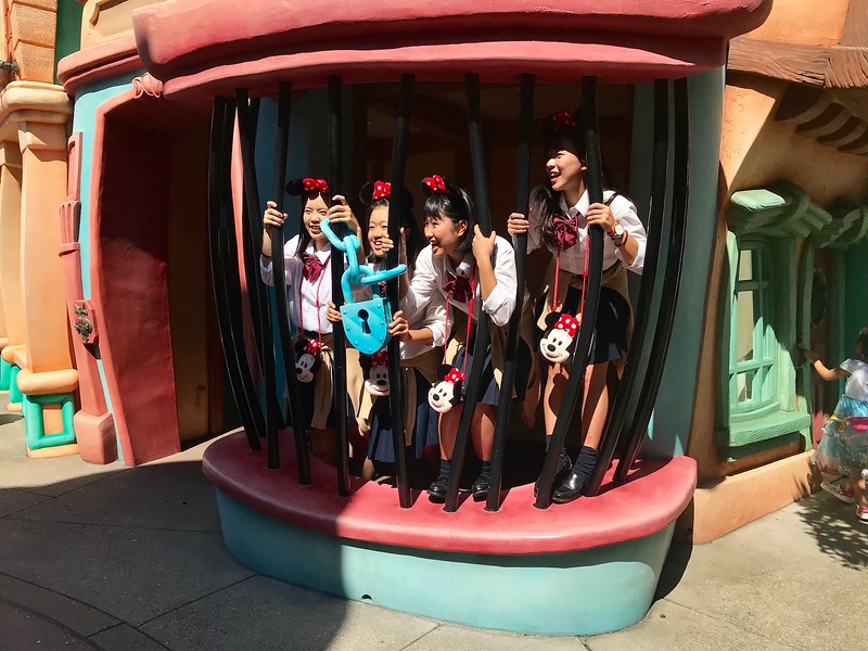 Schoolgirls pretending they’re in jail.