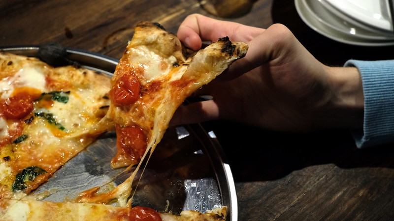 A cheesy slice of the Tamaki pizza.