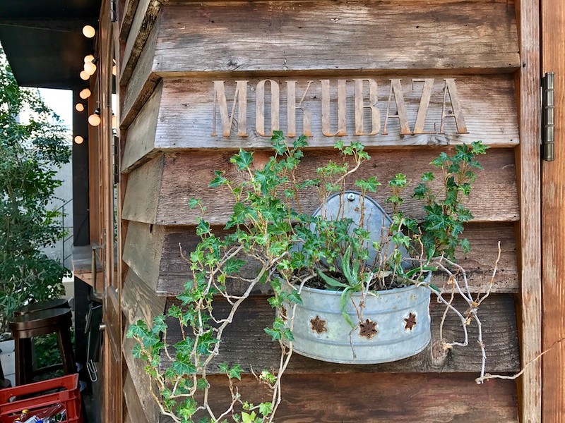 Lovely serif metal plated letters spelling the restaurant’s name next to the door.