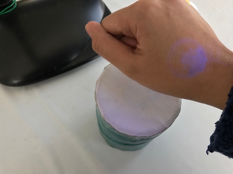 The stamp shows up purple under black light.