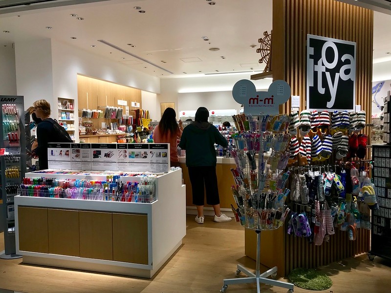 Pens, hats, tape, and notebooks on display at itoya.