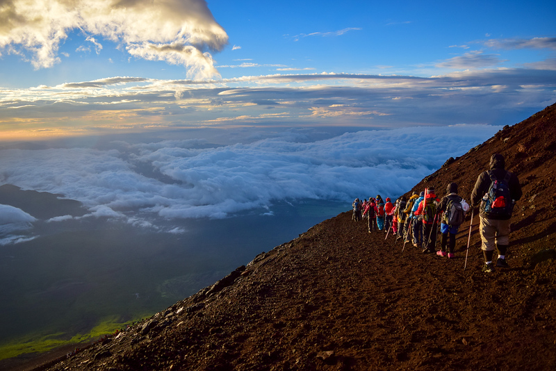 Climbers heading down Mt Fuji. Editorial credit: Nackoper / Shutterstock.com