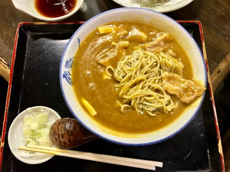 Uncovering the heap of soba noodles underneath the surface. Uncovering the heap of soba noodles underneath the surface.