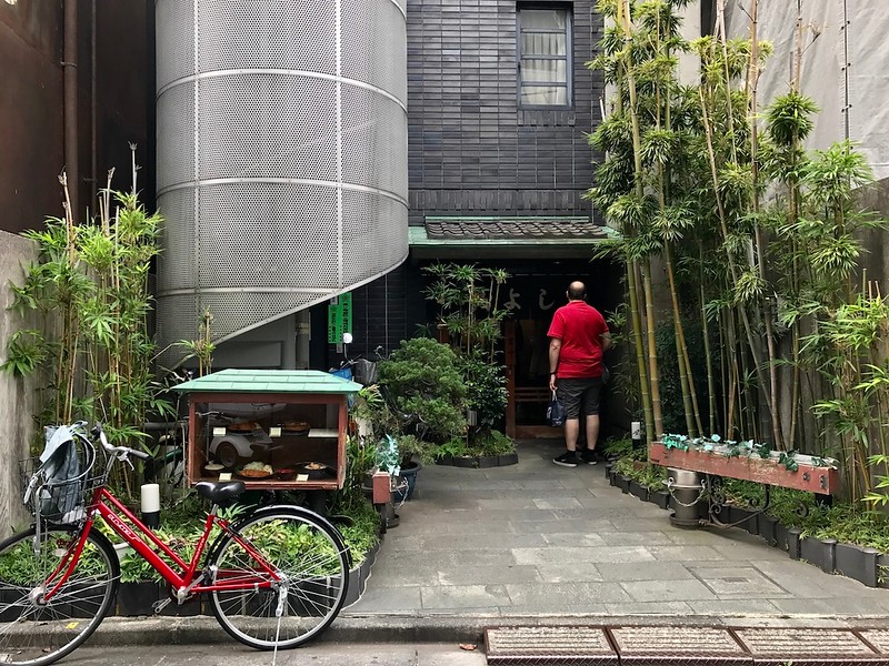 The entrance is understated, but also stands out in a street full of hip clothes stores.