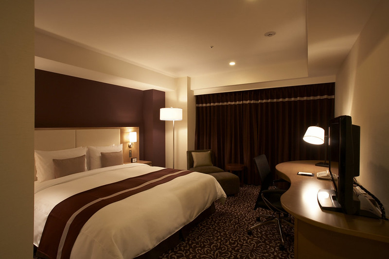 Atmospherically-lit double room in the Hotel Ryumeikan Tokyo at night Atmospherically-lit double room in the Hotel Ryumeikan Tokyo at night