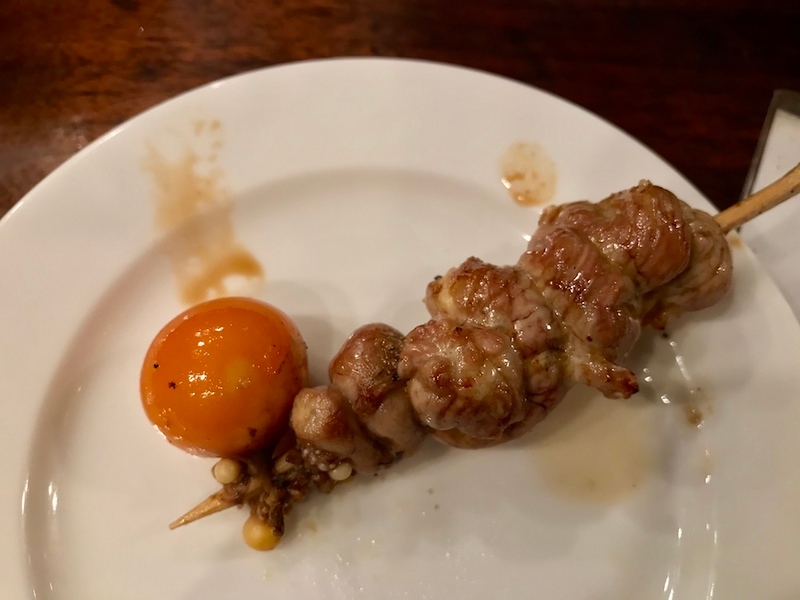 Chicken fallopian tube on a stick, overdone.