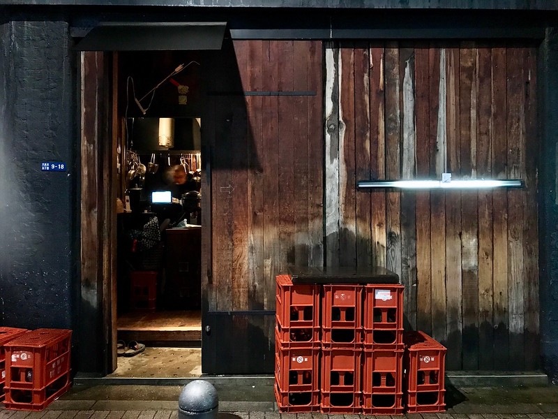 The entrance to Jomon, marked by red beer crates. The entrance to Jomon, marked by red beer crates.