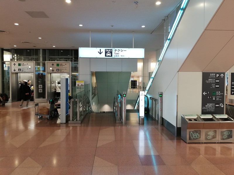 Escalator down to taxi ranks at Haneda