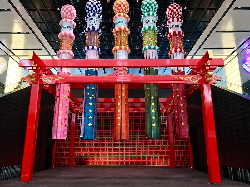 Colourful streamers decorate the center stage at Edo Market.