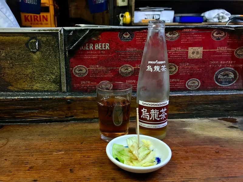 Oolong tea and a small plate of salted cabbage to begin with.