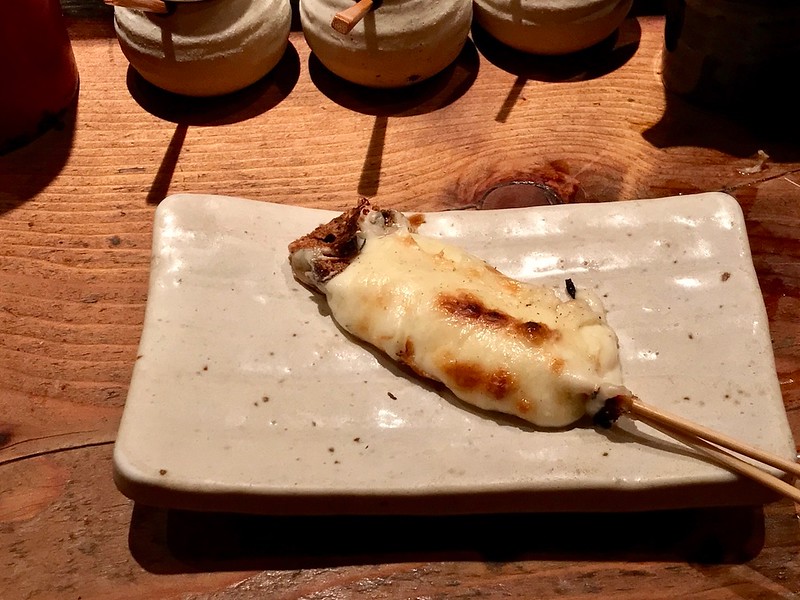 A mozzarella cheese skewer. A mozzarella cheese skewer.