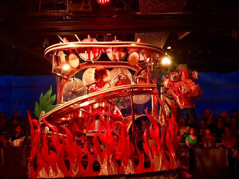 Taiko drummer on a dragon float.