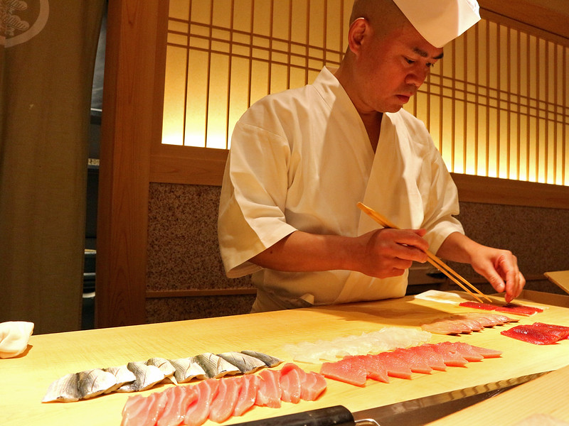 Itamae-san preparing sushi. Editorial credit: Ludi1572 / Shutterstock.com