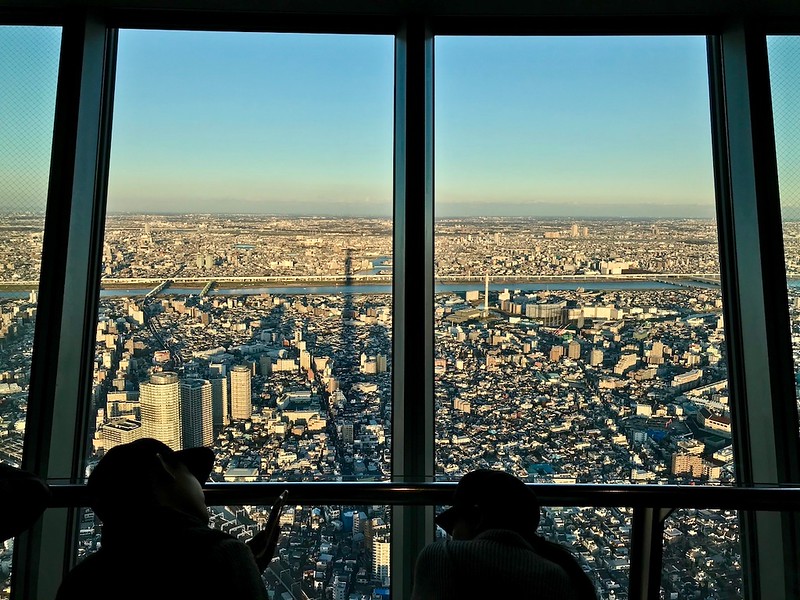 The Skytree casting a shadow on buildings below.