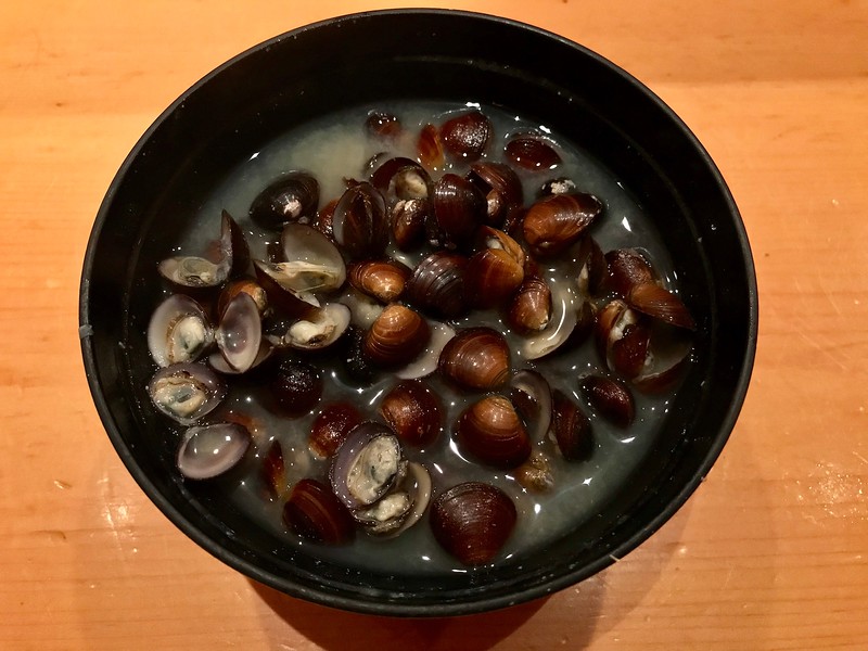 A second bowl of clam broth arrives towards the end of the meal - in this case filled with dozens of them. You do not need to pick out the meat from each one A second bowl of clam broth arrives towards the end of the meal - in this case filled with dozens of them. You do not need to pick out the meat from each one