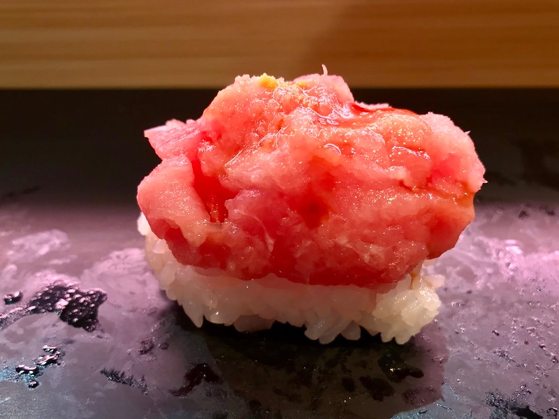 Closeup shot of zuniku  - nigiri with tuna head.