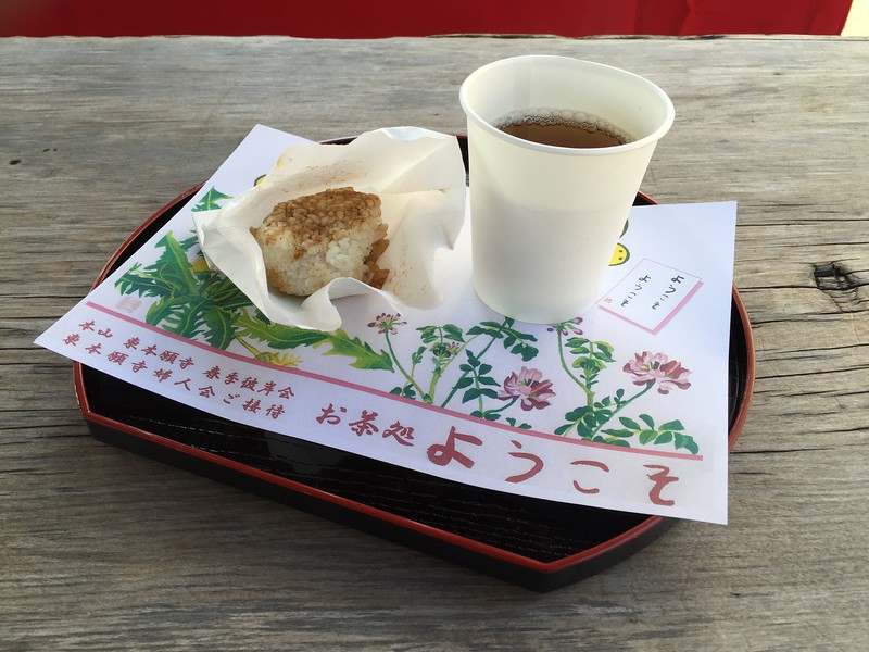 Complimentary rice ball and tea
