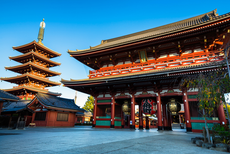 Distinctive red buildings and a pagoda in Senso-ji Temple in Asakusa, Tokyo, Japan