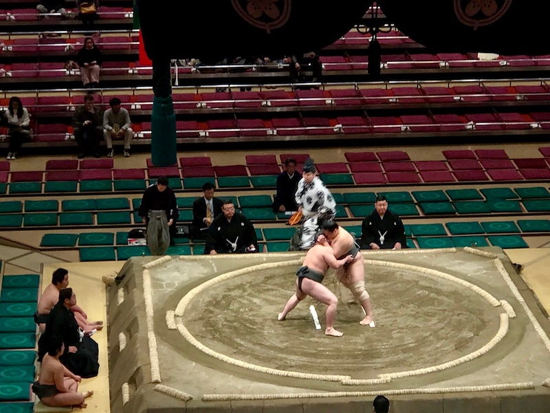 An early-morning sumo match