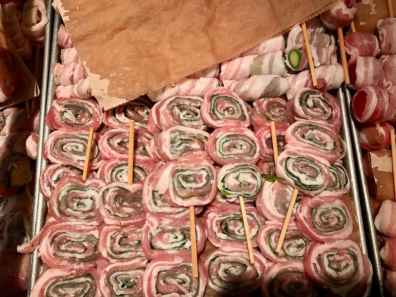 Hundreds of prepped skewers in the chiller in front of us, ready for grilling. Hundreds of prepped skewers in the chiller in front of us, ready for grilling.