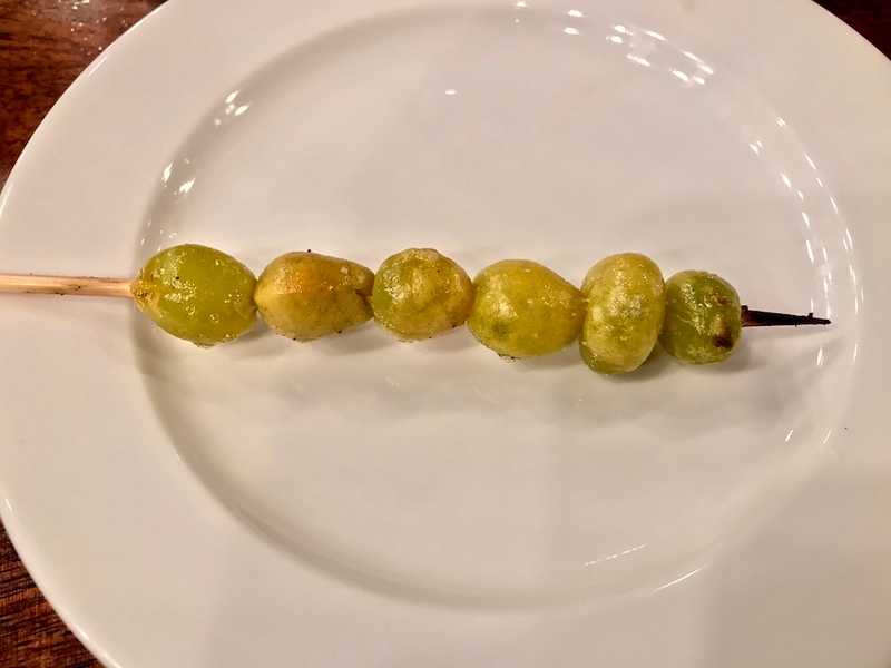 Gingko nuts on a stick.