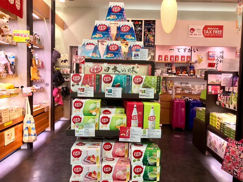 Kit-Kat boxes displayed at the front of a shop.
