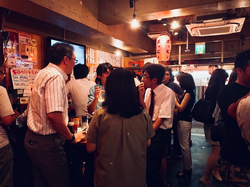 It’s lively in here. Everyone looks like they just finished work - even on Sunday.