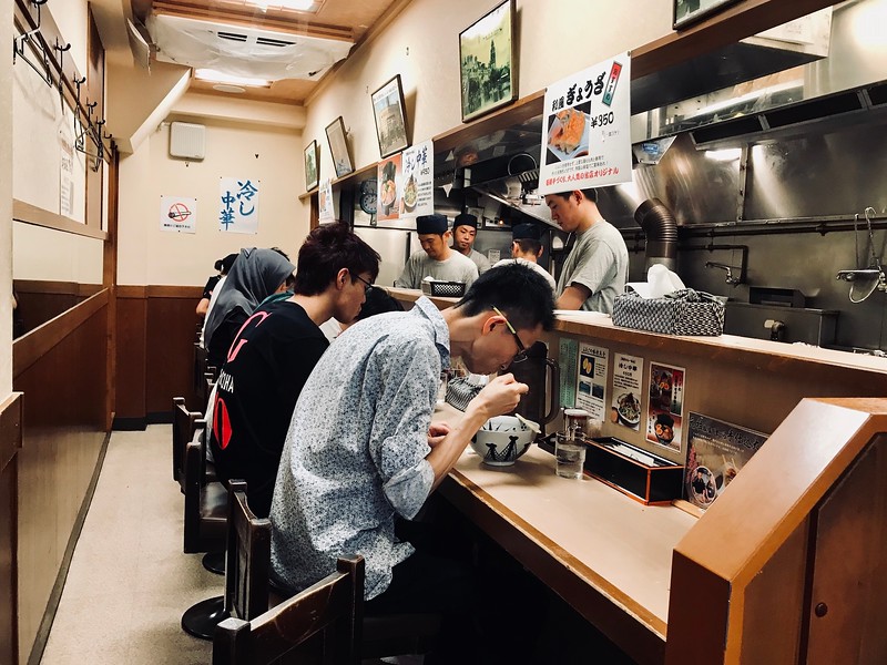 Inside the ground floor of Yoroiya with counter-only seating. There is a second floor with more tables to accommodate larger groups.