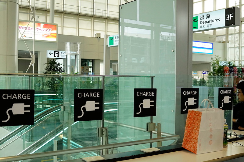 Charging stands near the information desk in the departures hall.