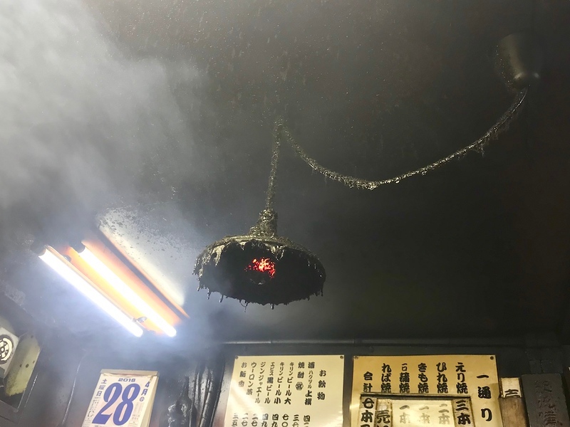 The lamp directly above the grill.