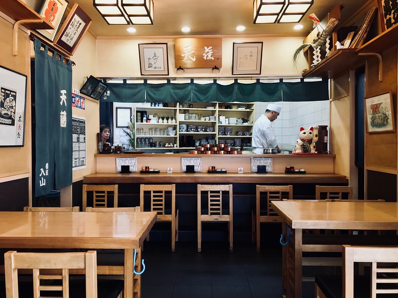 The restaurant space shares airspace with the kitchen.