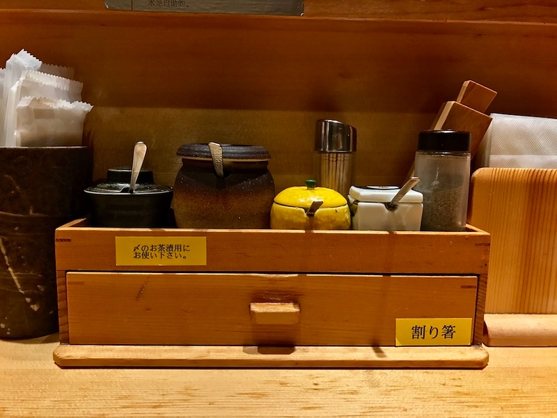 Chopsticks are in the drawer.