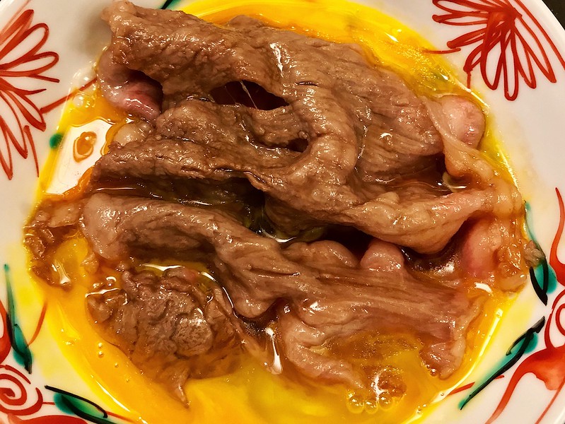 Wagyu beef in raw egg yolk, Ningyocho Imahan.