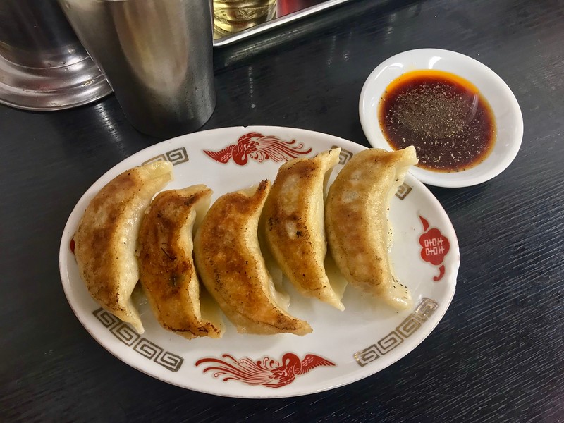 Make your own dipping sauce with soy sauce, vinegar, and chili oil.