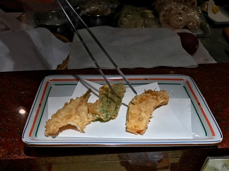 Tempura arriving on your plate in front of you.