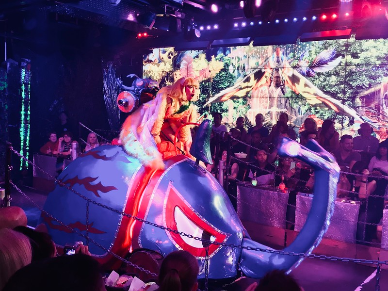 A butterfly princess on the back of a huge bug - straight out of Nausicaa?