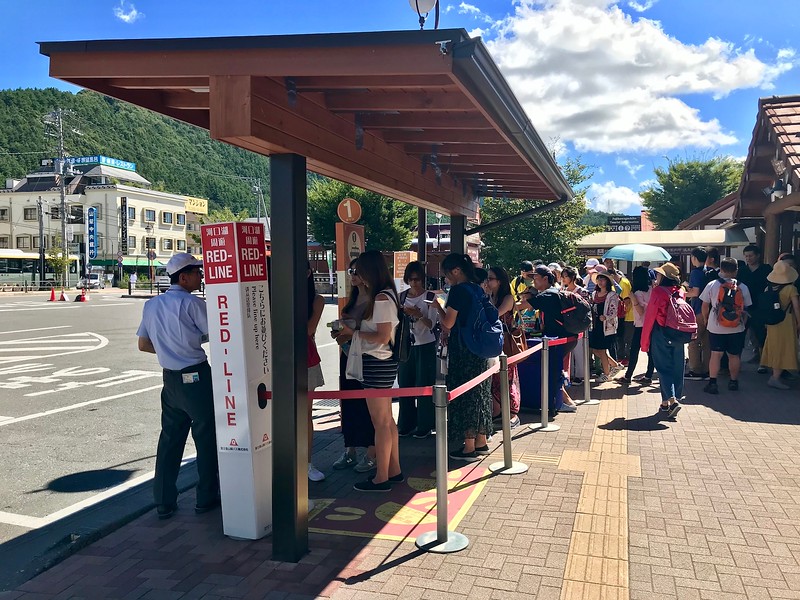 The Red Line bus stop directly in front of the station.