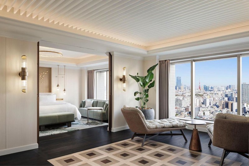 Elegant suite in the Westin Tokyo hotel with chaise longue in separate living area and sky high views over the city Elegant suite in the Westin Tokyo hotel with chaise longue in separate living area and sky high views over the city