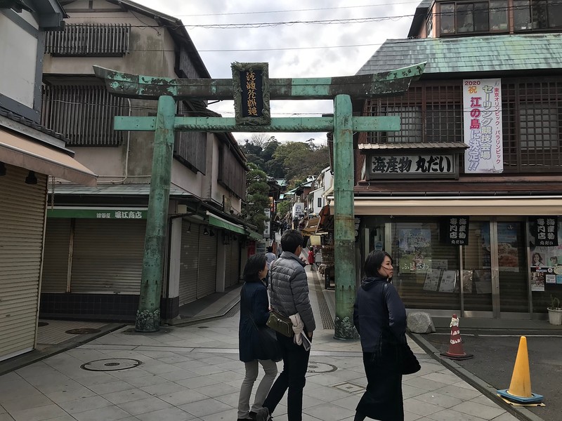 At the bottom of the shopping street.