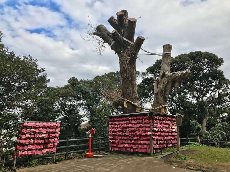 Pink wooden votive boards.